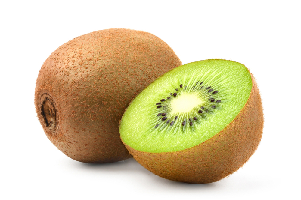 Kiwi fruit with cut in half isolated on white background.